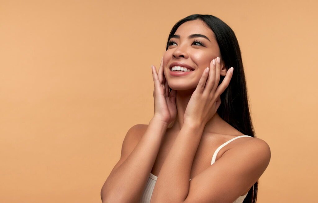 Young Woman Touching Clean Healthy Skin After chemical Peel