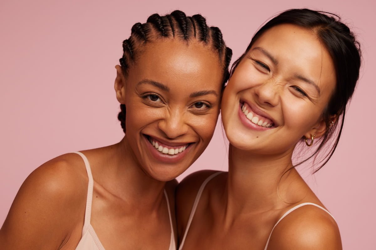 Young happy glowing women smiling