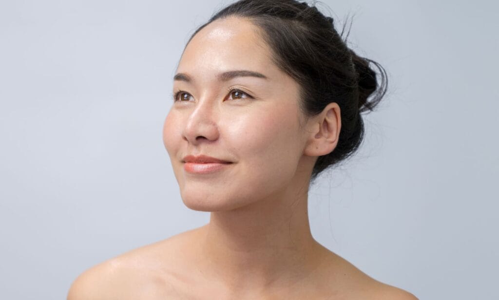 Woman with healthy, fair skin smiling