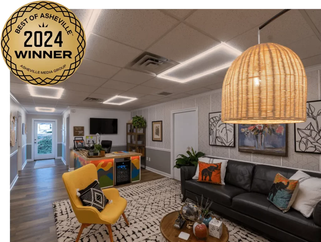 Waiting room at Mountain Radiance Medical Spa in Asheville, NC with a Best of Asheville 2024 Winner award in upper left corner