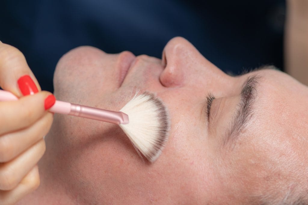 Close up of man getting a chemical peel at a medical spa