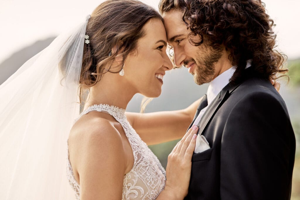 Asheville bride and groom smiling at a mountain wedding