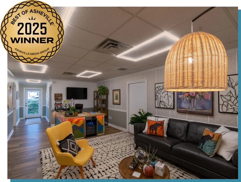Waiting room at Mountain Radiance Medical Spa in Asheville, NC with a Best of Asheville 2025 Winner award in upper left corner