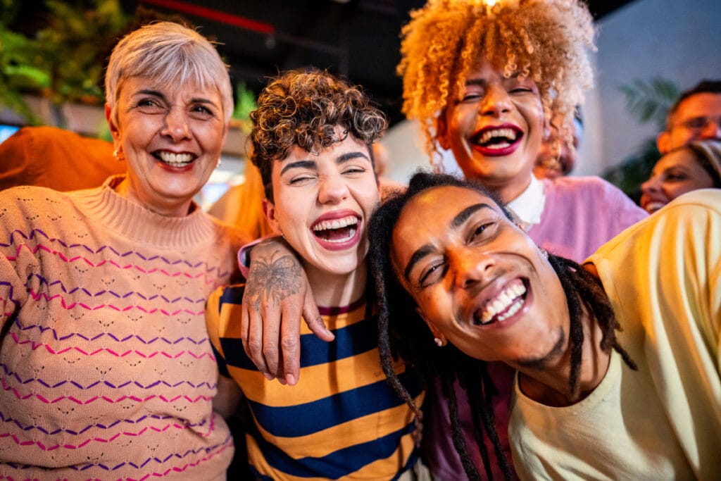 Group of smiling transgender and non-binary people after gender affirming care